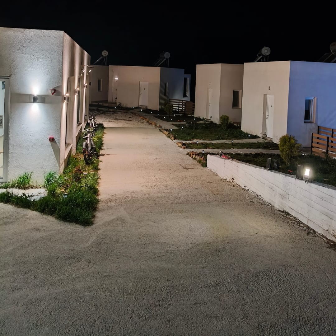 Reception outside area with room buildings at night